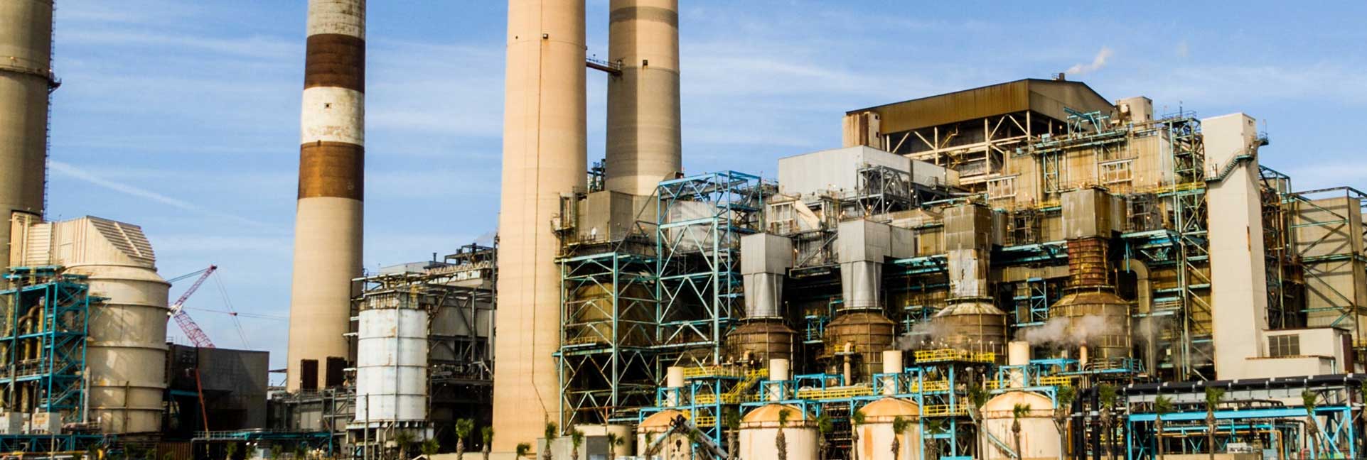 Large process plant with stacks and pipework